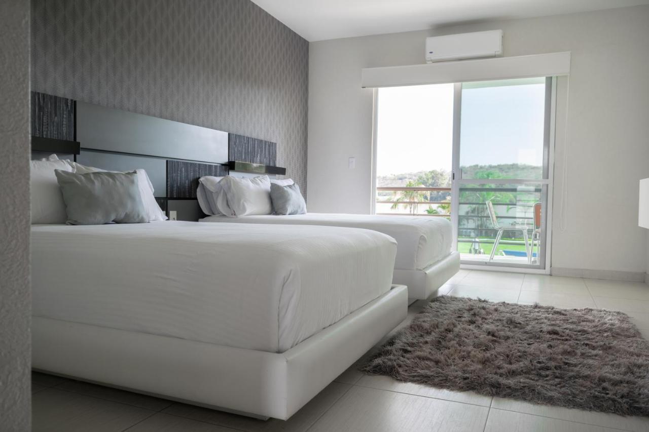 Hotel Aquetzalli Кокойок Экстерьер фото