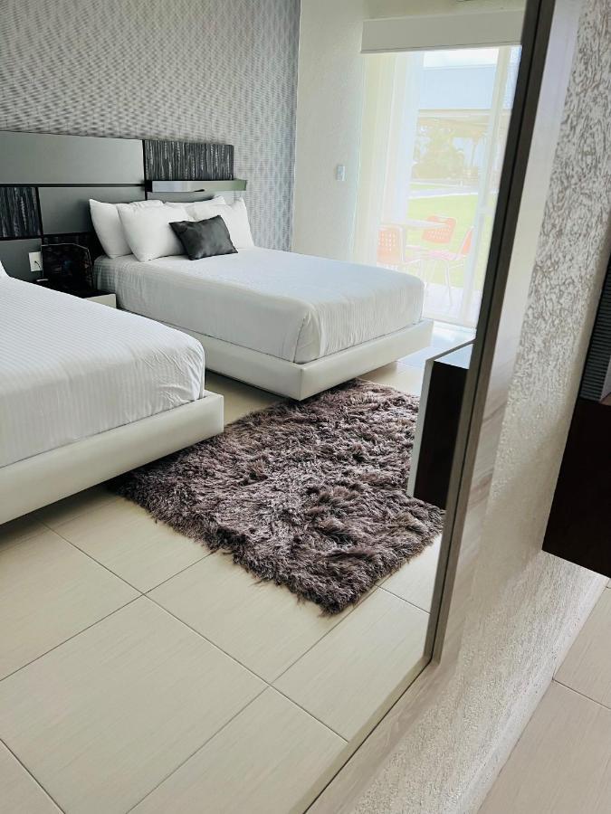 Hotel Aquetzalli Кокойок Экстерьер фото